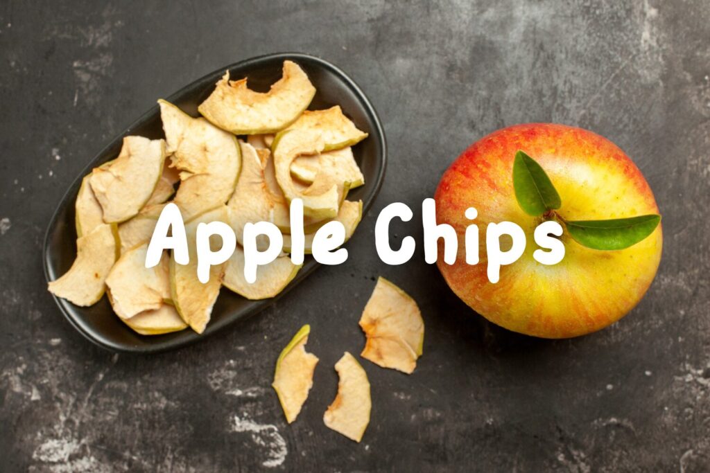 dehydrated apple chips - Top view fresh apple with dried apple on dark background